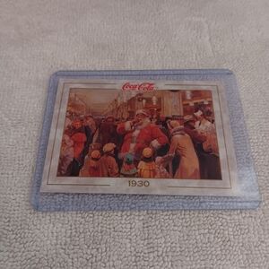 Coca-Cola Santa Claus Advertisement Card with Red Accents